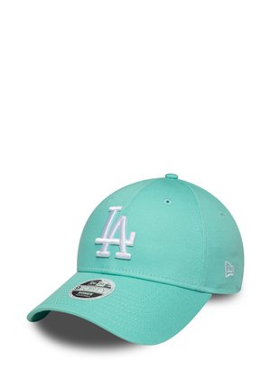 Light teal baseball cap with a raised white "LA" logo, curved brim, and eyelets for ventilation. Features a size label on the front.