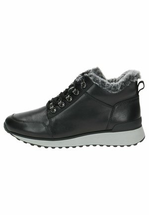 Bottines noires en simili cuir avec doublure en fausse fourrure grise, design à lacets, œillets métalliques et semelle en caoutchouc texturé.