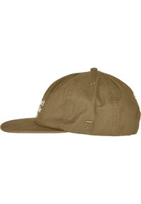 Khaki baseball cap with a flat brim and embroidered text on the front. Features ventilation holes and a logo insignia on the side.