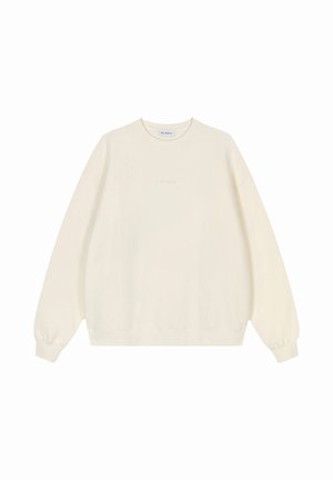 Felpa color crema con scollo rotondo, maniche lunghe e polsini a costine, caratterizzata da un sottile logo ricamato sul petto.