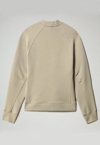 Sudadera beige con cuello redondo, mangas raglán y puños de canalé. Textura suave con costuras planas y una pequeña etiqueta de logo en el dobladillo.