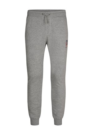 Grijze joggingbroek met boordjes bij de enkels, een trekkoortaille en kleine zwarte en rode tekst op de bovenste linker dij.