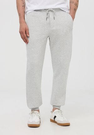 - Spodnie treningowe