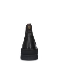 Stivali alla caviglia in pelle marrone scuro con punta arrotondata, pannelli laterali elasticizzati e suola in gomma nera. Presenta una linguetta con un logo sul retro.