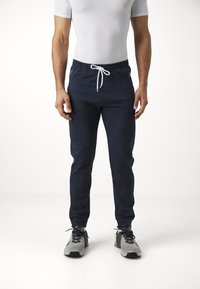 Champion ICON PANTS - Tepláky - navy