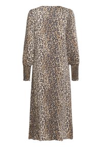 Leopard print dress in beige and brown, featuring a loose fit, long sleeves with elastic cuffs, and a knee-length hem. Smooth fabric texture.