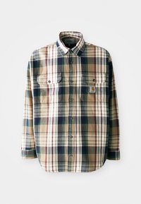 Camisa de cuadros en tonos marrón, marino, verde y burdeos. Cuenta con un cuello abotonado, dos bolsillos en el pecho y un pequeño parche con el logo. Tejido de algodón.