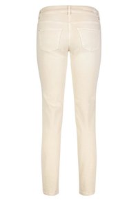 Jeans skinny de color beige claro con una textura suave, cinco bolsillos y detalles de costura sutiles en la pretina y los bolsillos traseros.