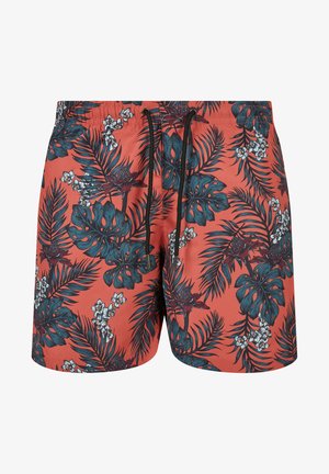 Červené plavky so žiarivým tropickým vzorom tmavozelených listov a bielych kvetov, s elastickým pásom a detailom šnúrky.