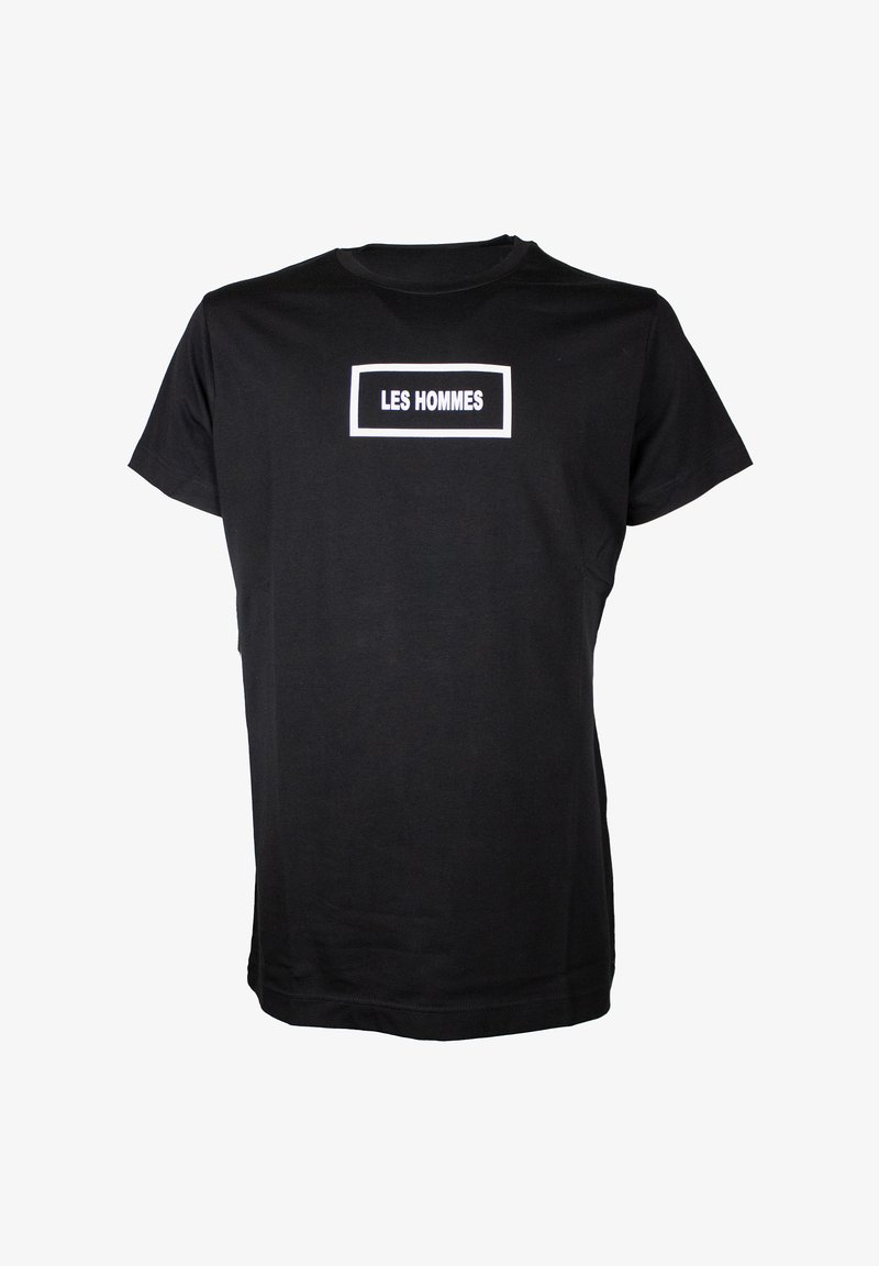 Black cotton t-shirt featuring a white rectangular box with the text "LES HOMMES" centered on the front. Short sleeves and crew neck design.
