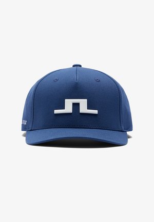 Niebieska czapka baseballowa z białym, abstrakcyjnym logo umieszczonym na środku przedniej części i napisem „FLEX” po lewej stronie.