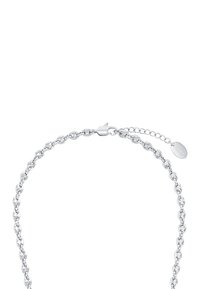 Bracciale in argento sterling con maglie ovali e chiusura a granchio. Include una catena regolabile con un piccolo ciondolo a un'estremità.