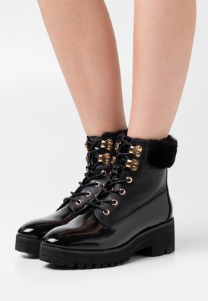 WINTER BOOTIES - Platåstövletter - black