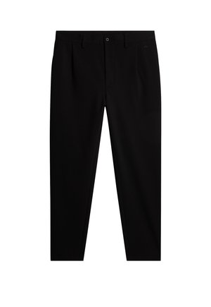 Pantaloni neri su misura in tessuto liscio, con pieghe frontali, zip e un logo discreto sulla vita. Taglio dritto classico.