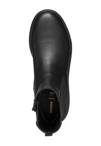 Bota de tobillo de cuero negro con un acabado suave, paneles laterales elásticos y punta redonda. El interior cuenta con una plantilla acolchada para mayor comodidad.