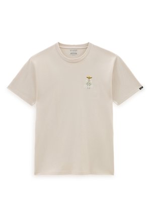T-shirt beige à manches courtes Vans avec un petit motif floral et le logo Vans sur la poitrine gauche, col rond et étiquette sur la manche droite.