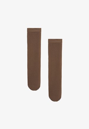 Coppia di calzini lunghi marroni con motivo a nido d'ape, disposti uno accanto all'altro su uno sfondo bianco.