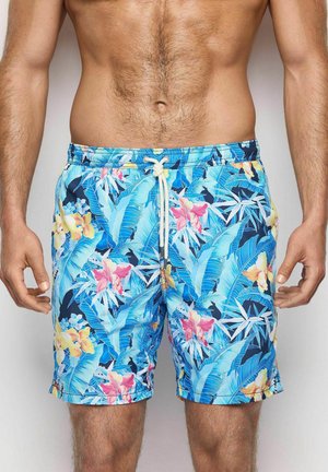 Shorts de baie florale albastre cu un amestec de flori mari roz și galbene, cu frunze verzi, talie cu șnur și un material ușor și neted.