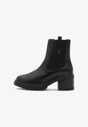 Mustad mustad nahast pahkluu saapad, maitsekate külgpaneelidega, tõmbejõu nubiga, paksu kontsaga tallaga ja tekstureeritud kummist väliskonnaga. Üksikasjalik viimistlus.