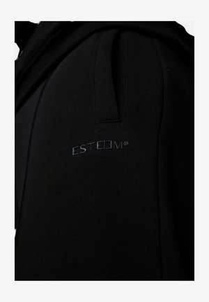 Black hoodie featuring soft fabric, ribbed detailing, and an "ESTEEM" logo in dark gray on the side. Design includes a front pocket.