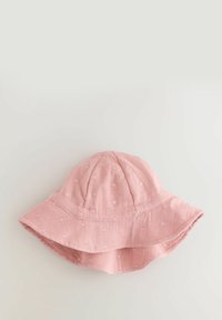Rosa Baumwollbucket-Hut mit einer weichen, strukturierten Oberfläche, ausgestattet mit einer runden Krone und breiter, weicher Krempe. Akzentuiert mit kleinen, erhabenen Punkten.