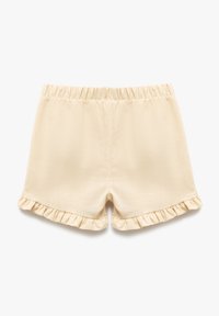 Pantalones cortos beige hechos de una tela ligera, con una superficie texturizada y un dobladillo rizado. Cintura elástica para mayor comodidad y facilidad de uso.
