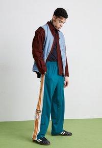 adidas Originals ADIBREAK - Pantalones deportivos - legacy teal