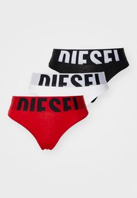 Three pairs of women's briefs in red, black, and white. Each features a wide black "DIESEL" waistband and a smooth, elastic fabric.