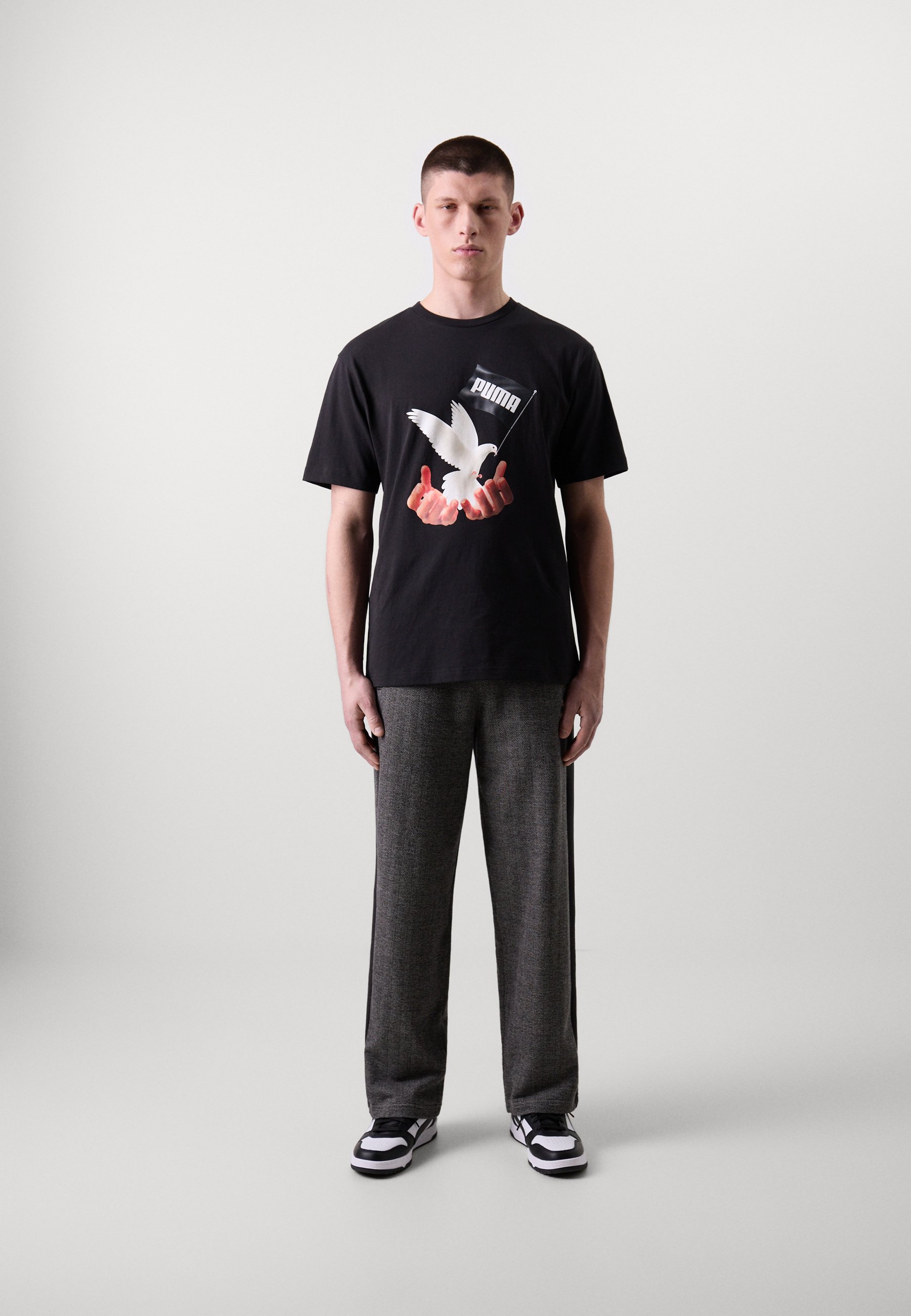 Puma - T-shirt z nadrukiem/czarny - Zalando.pl