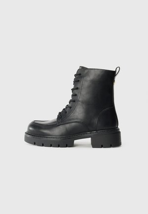 Bottines à lacets - black