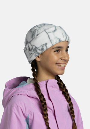 White fleece beanie with gray cartoon patterns, worn with a light pink jacket. Features a rolled cuff and a soft texture.