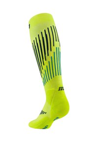 Calcetín amarillo brillante hasta la rodilla con patrones de rayas verticales en azul y negro, diseñado para uso atlético.
