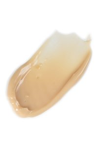 Beżowa kremowa o gładkiej, błyszczącej teksturze, nałożona w zakrzywionym kształcie, pokazująca gradient od jasnych do ciemniejszych odcieni.