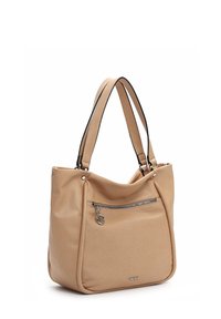 Sac à main en cuir beige avec deux poignées, poche avant zippée avec tirette ronde et petit logo métallique de la marque en bas à l'avant.