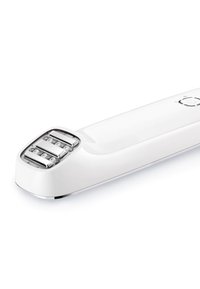 White handheld device with a smooth plastic surface, silver buttons, and a textured area featuring three metal strips at one end.