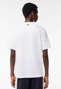 Lacoste Camiseta estampada - blanc