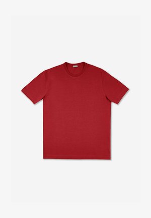 Camiseta de algodón roja con cuello redondo, mangas cortas y dobladillo recto. La tela tiene una textura suave y un color sólido sin patrones.