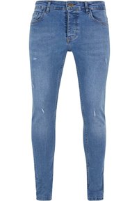 Világoskék farmernadrág, slim fit szabással, kopott részletekkel, öt zsebbel és gombos záródással.