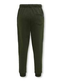 Pantalon de survêtement vert foncé avec une texture douce, taille élastique, chevilles ajustées et une seule poche arrière ornée d'un motif de point diamant.
