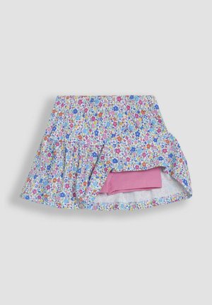 Šviesiai mėlynas gėlių sijonas, su spalvingomis gėlių raštais. Susiraukšlinta elastinga juosmens juosta su sluoksniuotu dizainu. Pridedama trumpa rožinė kelnaitė.