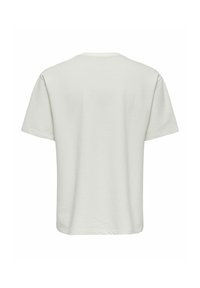 T-shirt en maille texturée gris clair uni à manches courtes, vu de dos sur un fond blanc.