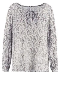 Blusa leggera di colore bianco con un motivo paisley in viola e grigio. Presenta un collo tondo e un dettaglio a fiocco nella scollatura. Maniche lunghe.