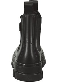 Black leather ankle boots with elastic side panels, a chunky sole, and a textured finish, featuring stitching details on the back.