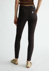 LIU JO BOTTOM UP  - Pantaloni - black