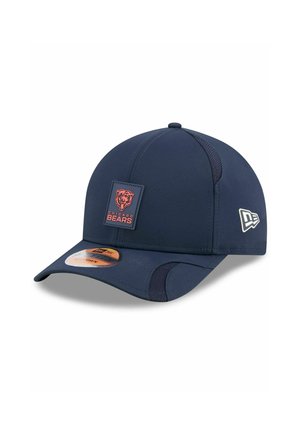 Navy blue baseball cap with a flat brim, featuring a textured Chicago Bears logo patch and mesh side panels for ventilation.