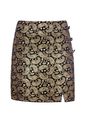 Sort nederdel med et gyldent paisley mønster, lige snit, sidelukninger og en slids på venstre side. Glat tekstur.