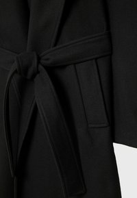 Stradivarius Klassinen takki - black