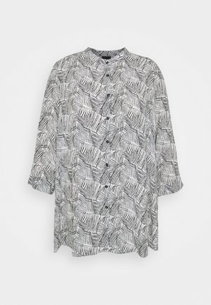 Overhemd met lange mouwen en knopen met opstaande kraag, met een abstract zwart-wit geometrisch lijnpatroon.
