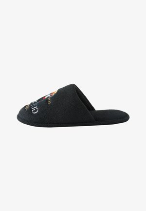Black fleece open-back slipper with embroidered multicolor crest and text on the front, viewed from the side on a white background.