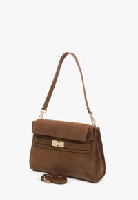 Brown suede handbag with a structured shape, a flat flap closure, and gold-tone hardware. Includes a detachable shoulder strap.